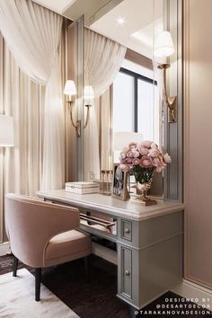 a dressing table with flowers on it in front of a large mirror and chandelier