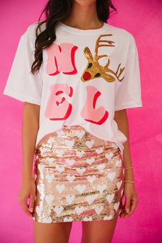 Don your festive style with this NOEL RUDOLPH TEE! This bright white tee features a playful pink "Noel" graphic and is topped with a shimmering sequin Rudolph patch — sure to bring some Christmas cheer to your wardrobe! Spread the jolly spirit of the season and stay merry all year round! This is a made-to-order item. All customized orders are currently shipping within 14 business days. To receive item quicker, expedited shipping is available at checkout. **LAST DAY TO ORDER CHRISTMAS PRODUCTS WI Christmas Sweater Outfits, Cute Christmas Outfits, Christmas Products, Judith March, Xmas Sweater, Christmas Outfits, Christmas Love, Kind Heart, White Tee