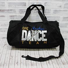 Personalized dance team duffle bag. This bag is ready to hold all your stuff whether for after school practice, competitions or even a weekend at grandma's! Add a name for a super personalized bag. TOTE bag measures 12x18"with a zippered top. SMALL barrel duffle bag measures 18”x10”x10”, with a side zippered pocket. LARGE square bottom duffle bag measures 24”x12 x11”, with a front zippered pocket. Personalized Sporty School Bag, Sporty Personalized School Bag, Customizable Sporty School Bags, Personalized Bags For Everyday School Use, Sporty Customizable School Bags, School Spirit Personalized Bags For Everyday Use, Customizable School Spirit Bag For Everyday, Customizable School Spirit Bags For Everyday Use, Personalized School Spirit Bags