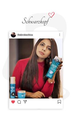 a woman in red shirt holding up a bottle of shampoo and some other items