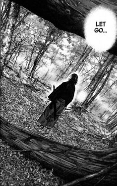 a black and white photo of a person standing on a fallen tree in the woods