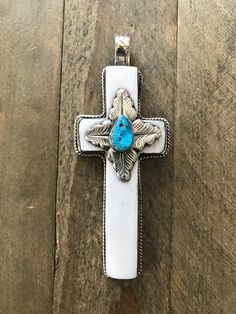 Bone cross pendant in Tibetan silver set with turquoise. Each pendant is approximately 98X39 mm including bail and weighs about 30 gm. Images may appear enlarged or smaller, please refer to the measurements given. Gm Images, Pendant Set, Cross Pendant, Favorite Jewelry, Native American, Bones, Jewelry Necklace Pendant, Etsy Accessories, Jewelry Necklaces