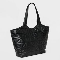 Add a sleek finishing touch to your casual or dressy ensembles with this Shopper Tote Handbag from A New Day™. Beautifully woven, this unstructured tote handbag is designed with a spacious main compartment with multiple pockets to stash your phone, wallet, makeup essentials and more when you're on the go. The magnetic closure helps keep the contents secure, while the double handle allows for convenient carrying. A New Day™: Style that goes wherever you do. Black Structured Shopping Bag, Black Structured Bag For Shopping, Structured Black Shopping Bag, Structured Black Bag For Shopping, Chic Textured Shoulder Bag For Shopping, Knitting Tote, Work Tote, Shopper Tote, Tote Handbag