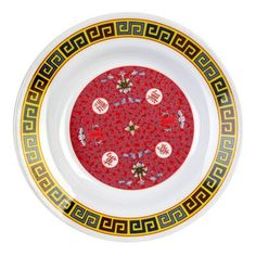 a white bowl with red and yellow designs on it