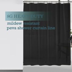 the shower curtain is black and has blue lettering on it that says, 8g heavy duty mildew resistant peva shower curtain line