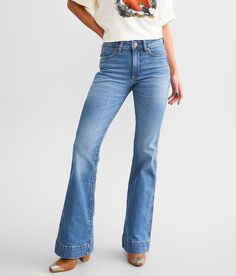 Wrangler® Retro Trouser Stretch Jean - Blue 31/32, Women's Eliza High rise Slim through the hip and thigh 20 bottom opening. 96% Cotton 3% Polyester 1% Spandex. Machine wash cold inside out with like colors gentle cycle. Only non-chlorine bleach when needed. Tumble dry low or line dry. Low iron.. WOMEN'S WRANGLER SIZE CONVERSION CHART Waist (size) 24 25 26 27 28 29 30 31 32 33 34 35 Juniors 00 0 1 3 5 7 9 11 13 15 17 19 Misses 00 0 2 4 6 8 10 12 14 16 18 20 *Conversion sizes may vary. Apparel & Womens Wranglers, High Waisted Wrangler Jeans, Wrangler Womens Jeans, Wrangler Retro Jeans Women Outfits, Wrangler Jeans Women's Outfit, Women’s Jeans, Wrangler Trouser Jeans, Wrangler Jeans Women's, Women’s Wrangler Jeans