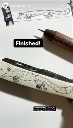 an image of a pen and scissors with the words finished written on it in black ink