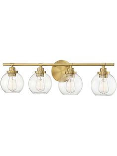 three light bathroom fixture with clear glass globes on the wall and gold metal fixtures