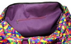 When you're the life of the party, even your duffel bag gets in on the action. The perfect size for a weekend away, this colorful duffel is printed with our own rainbow confetti design. Trimmed in purple faux leather, with purple handles, removable purple shoulder strap, a black zipper, and purple canvas interior lining with extra zipper pocket, this duffel has room for a three-day weekend's worth of outfits, including shoes! 22" long by 10" wide by 13.5" tall (56 cm x 25 cm x 34 cm) Purple vega Rectangular Purple Travel Bag For On-the-go, Everyday Purple Rectangular Travel Bag, Purple Rectangular Duffle Bag For Daily Use, Rectangular Purple Duffle Bag For Everyday Use, Rectangular Purple Duffle Bag, Rectangular Purple School Travel Bag, Purple Travel Bag With Luggage Sleeve For Everyday Use, Purple Rectangular Duffle Bag For Travel, Rectangular Purple Duffle Bag For Travel