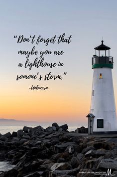 a lighthouse sitting on top of a rocky beach next to the ocean with a quote from unknown