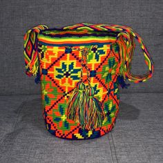 Authentic Colombian Wayuu Bags Each Is One Of A Kind Hand Made By The Tribe In La Guajira Green Backpack For Shopping, Green Shopping Backpack, Multicolor Large Capacity Crossbody Bag, Multicolor Large Capacity Pouch Shoulder Bag, Casual Multicolor Bag, Multicolor Crochet Travel Bag With Large Capacity, Multicolor Large Capacity Crochet Travel Bag, Large Capacity Multicolor Crochet Travel Bag, Woven Bucket Satchel For Travel