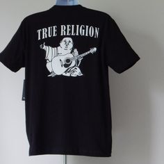 Brand New With Tags True Religion Buddha Graphic Premium Casual T-Shirt 100% Guaranteed Authentic Style 103307 Color Black Size Xl 100% Cotton Crew Neck; Short Sleeve Relaxed Fit Back Embellished With Black & White Buddha Graphic Horseshoe On Front Please Make Sure You Check Measurements Before Purchasing Approx. Measurement Taken By Hand Laying Flat (Inches) *** Can Be Slightly Off Size Armpit To Armpit Length Xl 23 In 31 In All Items Come From A Very Clean Smoke Free And Pet Free Home Thanks F True Religion Shirt, White Buddha, Buddha Logo, True Religion Men, T Shirt World, Thermal Shirt, Tour Shirt, Tour T Shirts, Casual T Shirt