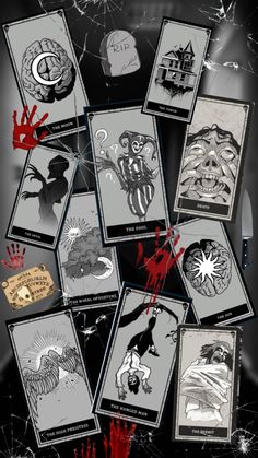 a bunch of cards that have been placed on top of some kind of black and white background