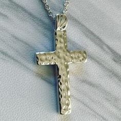 This stunning hammered cross pendant's rich and geometric texture give it a beautiful design for any occasion. Hammered Cross Necklace, Faith Based Jewelry, Geometric Texture, Sterling Silver Cross Necklace, Necklace Cross, Geometric Textures, Wedding Jewellery Necklace, Religious Jewelry, Hammered Silver