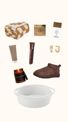 the contents of a white basket with brown accessories