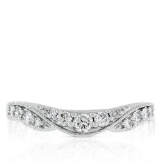 a white gold wedding band with diamonds