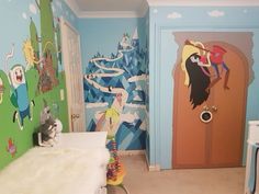 a child's bedroom decorated with cartoon characters on the walls and in the doorway