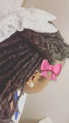 @kaiyahwyd Two Bun Loc Style, Loc Styles With Bow, Locs Hairstyles Ponytails, Hairstyle On Locs, Easy Dreadlock Hairstyles, Kids With Locs, Lock Hairstyles, Short Dreadlocks Styles, Dread Styles