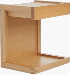 a wooden table with one drawer open