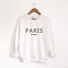 Paris France Sweatshirt, Paris Sweater, Paris Trip Sweatshirt, French Gift,  Paris Souvenir Sweater, Paris Vacation Shirt Ideal for any situation, a unisex heavy blend crewneck sweatshirt is pure comfort. These garments are made from polyester and cotton. This combination helps designs come out looking fresh and beautiful. The collar is ribbed knit, so it retains its shape even after washing. There are no itchy side seams on these sweaters.  .: Made with a medium-heavy fabric blend of 50% cotton Paris Sweater, Paris Souvenirs, French Gifts, Paris Vacation, Paris Trip, Vacation Shirts, Paris Travel, Heavy Fabric, Cut And Style