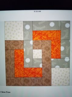 an orange and gray patchwork design on a computer screen