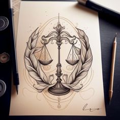 a drawing of a scales of justice on top of a piece of paper next to a pen