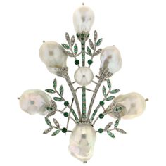 For any problems related to some materials contained in the items that do not allow shipping and require specific documents that require a particular period, please contact the seller with a private message to solve the problem. Floral composition brooch white gold 18 karat composed of 7 australian baroque pearls baroque and diamonds and emeralds on the leaves and stems. Brooch total weight 58.40 grams Emeralds weight 1.62 karat Diamonds weight 0.52 karat Pearls weight 36,00 grams Pearls size fr Floral Composition, Pearl Pin, White Gold Sapphire, Art Nouveau Jewelry, Diamond Brooch, Unique Diamonds, Pearl Brooch, Pearl Size, Emerald Diamond