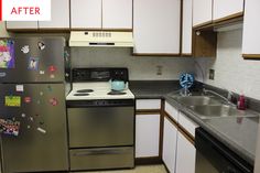 a kitchen with stainless steel appliances and white cabinets