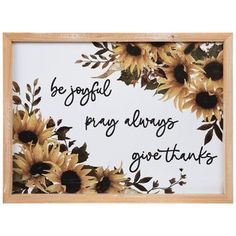 a wooden frame with sunflowers and the words be grateful, pay always give thanks