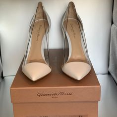 Elevate Your Look With These Stunning White Leather Gianvito Rossi Plexi Heels. The Transparent Pvc Sides Add A Modern Touch To This Classic Design, And The 105mm Stiletto Heel Adds A Touch Of Height And Elegance. These Shoes Are In New, Never Worn Condition And Come With The Original Box And Shoe Bag. Chic Wedding Shoes With 4-inch Heel, Elegant Open Toe Court Shoes With Reinforced Heel, Chic High Heel Court Shoes For Events, Chic Closed Toe Court Shoes For Events, Chic Closed-toe Court Shoes For Events, Chic Open Toe Court Shoes With Contrasting Heel, Chic Pointed Toe Court Shoes For Event, Chic Pointed Toe Court Shoes For Events, Chic High Heel Court Shoes For Cocktail