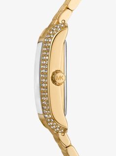 Side panels of understated pavé crystals add shine to the rectangular face of our petite Emery watch. The polished beveled strap is made of gold-tone stainless steel, while the dial features Roman numeral indexes for a luxurious finish. Glamorous enough to pair with evening looks yet understated enough to complement a simple T-shirt and jeans, this is a timeless style you’ll never want to take off. Luxury Rectangular Jewelry With Gold-tone Hardware, Gold Jewelry With Diamond Accents And Rectangular Dial, Gold Diamond Watch With Rectangular Dial, Elegant Michael Kors Diamond Watch, Gold Diamond Watch With Rectangular Case, Gold Rectangular Diamond Watch With Polished Finish, Gold Diamond Watch With Rectangular Shape, Gold Diamond Watch With Rectangular Face, Michael Kors Gold Watches For Formal Occasions