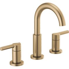 two faucets in brushed brass finish