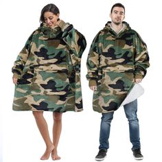 a man and woman in camouflage coats standing next to each other