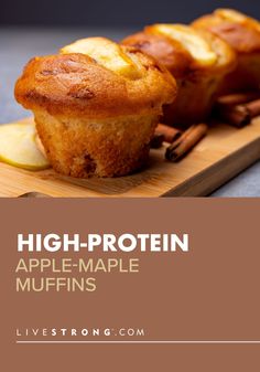 apple - maple muffins on a cutting board with cinnamon sticks and an apple slice