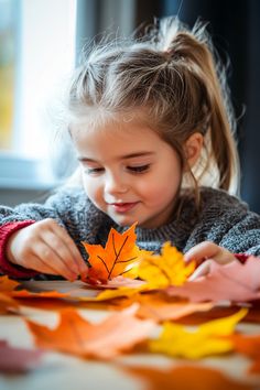 Young girl enjoying crafting with colorful autumn leaves. Cozy Up Your Home, Diy Fall Decor, Leaf Animals, Fall Bedding, Unique Fall, Cut Out Shapes