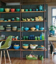 a room filled with lots of different colored dishes