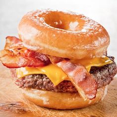 a bacon cheeseburger on a bagel bun