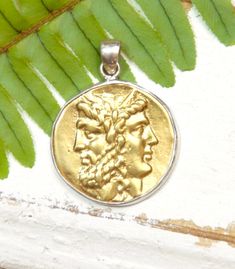 This beautiful ancient coin pendant was made with a Greek coin of Janus. Janus was the god of the past/future, beginnings and endings, and openings and closings. The month of January was named for this Greek god. The coin itself is bronze, and we plate the coin with 18K Gold, and then framed it in 925 Sterling Silver. This is a quality handmade item, that will match any other jewelry combinations both silver and gold. Any woman, man, teen, and history lover will love and appreciate this wonderfu Janus Jewelry, Greek Coin Pendant, Ancient Coin Pendant, Gold Coin Pendant, Ancient Greek Coin, Ancient Coin, Greek Coins, Antique Coins, Bee Pendant