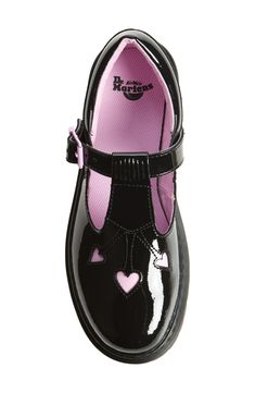 The brand's instantly recognizable chunky sole and iconic yellow topstitching meet the sweet poise of a mary jane in this kid-sized, patent style with contrast heart cutouts. Adjustable strap with buckle closure Leather upper and lining/synthetic sole Imported Black Patent Mary Janes, Red Patent Mary Janes, Pink Leather Mary Janes With Rubber Sole, Kids Mary Jane Shoes, Mary Jane Shoes Kids Black, Doc Martens Outfits, Black And Pink, Doc Martens, Color Therapy