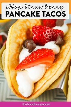 pancakes with strawberries and chocolate chips on top are shown in this postcard image