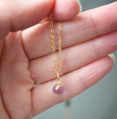 If you're looking for a dainty, sparkly necklace with powerful properties, this tiny pale Amethyst drop necklace is for you! Crafted with 14k gold filled, this delicate beauty will add a subtle pop of color and good vibes to your day. Amethyst is believed to bring its bearer protection and healing, while enhancing passion, creativity, and spirituality. It's also said to assist with temperance and sobriety, as well as inflammation.This necklace is handcrafted with a small pale purple Amethyst fac Dainty Teardrop Birthstone Crystal Necklace, Gold Gemstone Drop Necklace In Dainty Style, Dainty Crystal Necklace With Teardrop Pendant On Delicate Chain, Dainty Birthstone Necklace With Delicate Chain And Teardrop Pendant, Delicate Purple Jewelry For Everyday, Dainty Briolette Faceted Crystal Necklaces, Dainty Rose Gold Crystal Necklace, Dainty Faceted Briolette Crystal Necklace, Dainty Briolette Faceted Crystal Necklace