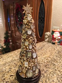 a christmas tree made out of watches on a counter