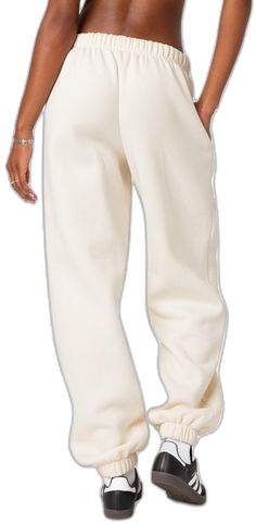 Oversized Cotton Sporty Joggers, Relaxed Tapered Leg Sweatpants In Solid Color, Straight Cotton Sweatpants For Fall, Cotton Straight Sweatpants For Fall, Trendy Cotton Straight Leg Joggers, Solid Cotton Sweatpants For Streetwear, Casual Cream Pants For Everyday, Trendy Straight Leg Cotton Joggers, Sporty Oversized Cotton Sweatpants