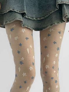 Step into a world of dreamy elegance with our white and blue stars milk white sweet summer tights. These enchanting tights feature a delicate pattern of white and blue stars, set against a soft milk-white backdrop. Perfect for adding a touch of whimsy to your summer wardrobe, they are crafted from lightweight, breathable fabric to keep you cool and comfortable on warm days. The stretchy material ensures a snug yet flexible fit, making them ideal for pairing with your favorite dresses, skirts, or Stretch White Summer Tights, White Stretch Tights For Summer, Trendy White Spring Tights, Trendy White Tights For Spring, Trendy White Hosiery For Summer, White Stretch Stockings For Summer, White Star Print Summer Bottoms, Summer White Star Print Bottoms, White Summer Bottoms With Star Print