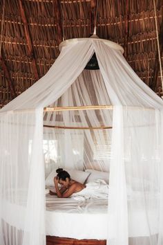 a person laying in a bed with a white canopy over their head and the caption reads, send