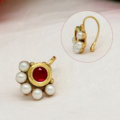 Nose Cuff: Length: 2.00 CM x Width: 1.00 CM Metal: Alloy:Gold Plated Color: Multi | Stone: Kundan Gross Weight: 11.00 Grams Care Instruction : Avoid direct Heat & Chemicals Like Perfume, Alcohol, Etc. | Clean With Dry Cotton Cloth | Pack In An Air Tight Container After Use. Made in India Elegant Metal Nose Rings As Gift, Adjustable Gold Nose Rings For Gift, Adjustable Gold Nose Rings As Gifts, Elegant Handmade Nose Rings For Gifts, Adjustable Round Nose Rings As Gift, Adjustable Nose Rings For Gift, Nose Cuffs, Nose Cuff, Nose Pins