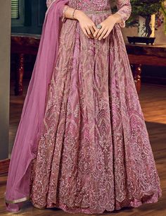 COLOR : Charm Pink FABRIC : Top - Net, Bottom (Lehenga) - Satin, Inner - Santoon, Dupatta - ChiffonWORK : Heavy Resham Work, Tonal Glitter Cord, Sequins, Stones, Motifs, Lace Border OCCASION : Wedding, Reception, Engagement READY-TO-WEAR : NoSTITCHING : Available as semi-stitched fabric, can be stitched using standard size option (+$30). Note: There might be a slight color variation due to lighting and flash used during photoshoot. The bright shade seen is the best closer view of fabric's color. Wedding Anarkali, Resham Work, Anarkali Gown, Anarkali Suit, Lace Border, Pink Fabric, Anarkali, Fabric Color, Lehenga