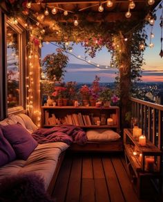 a porch covered in lots of lights and books on top of a wooden floor next to a window