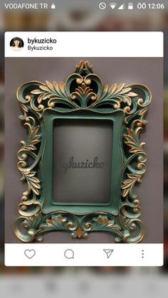 an ornate green and gold frame with the word auzico written in cursive writing