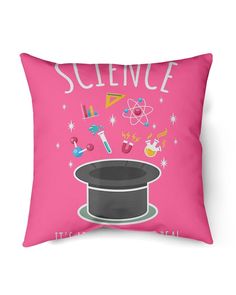 a pink pillow with an image of a top hat and science symbols on the front